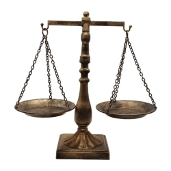 A vintage style jewelry organizer in the shape of Libra Scales