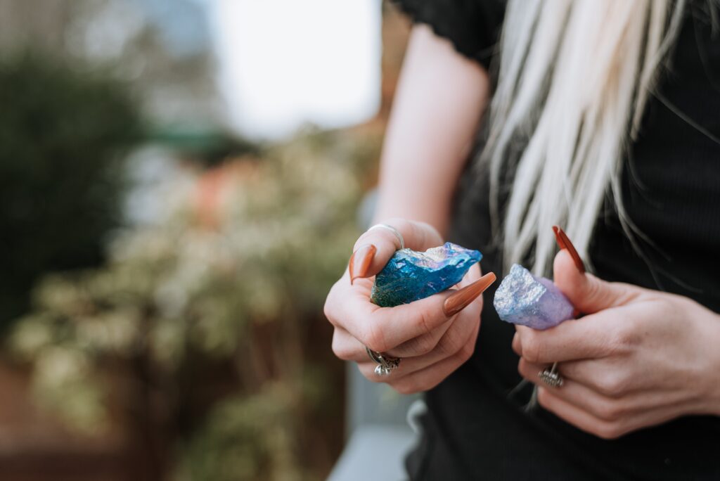 Woman holding crystals in hands for protection